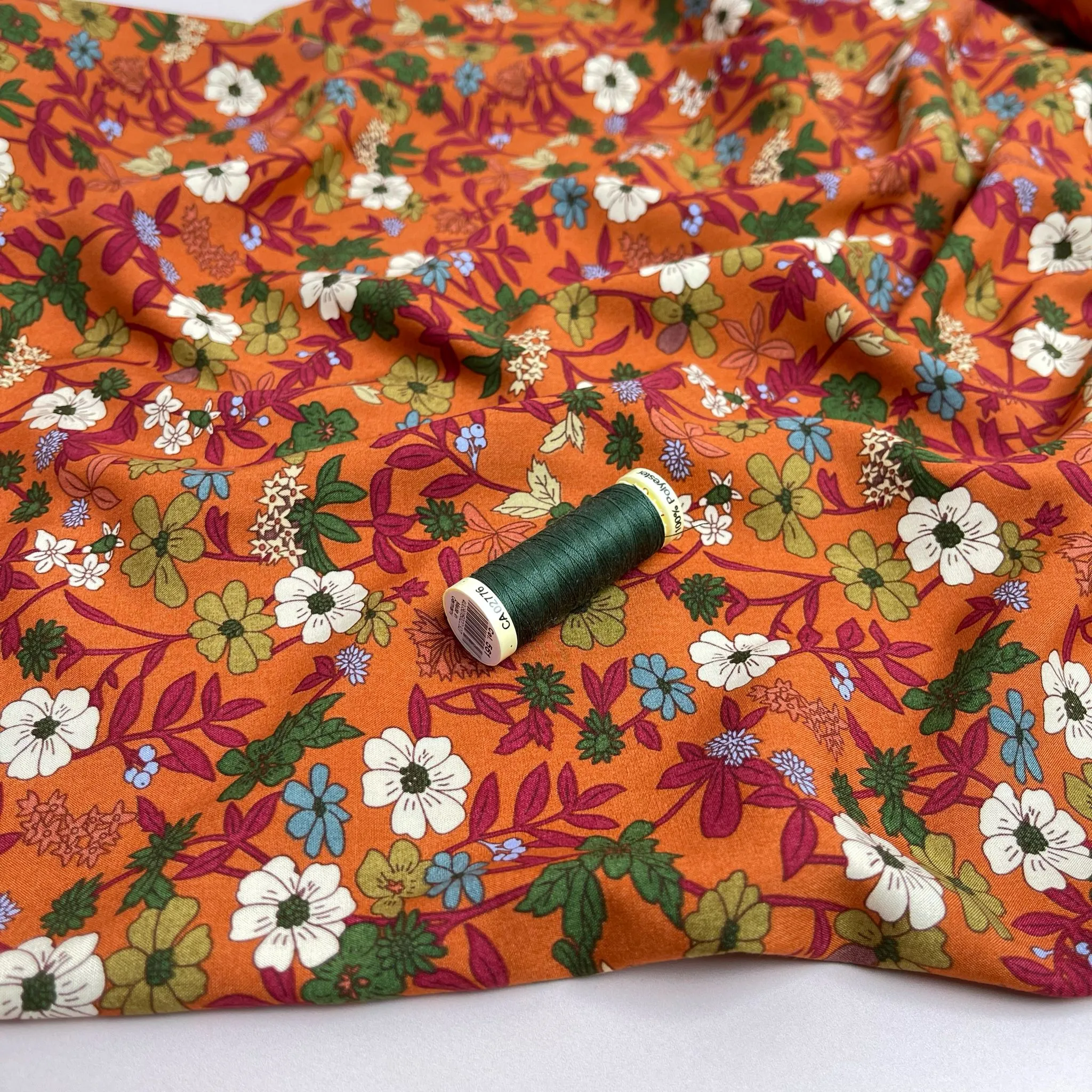 Autumn Blossoms on Orange Viscose Fabric